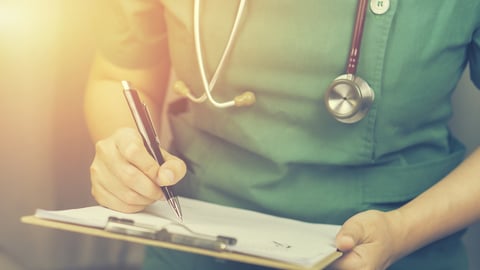 female doctor,surgeon,nurse,pharmacy with stethoscope on hospital holding clipboard,writing a prescription,Medical Exam,Healthcare and medical concept,test results,vintage color,selective focus; Shutterstock ID 440808748