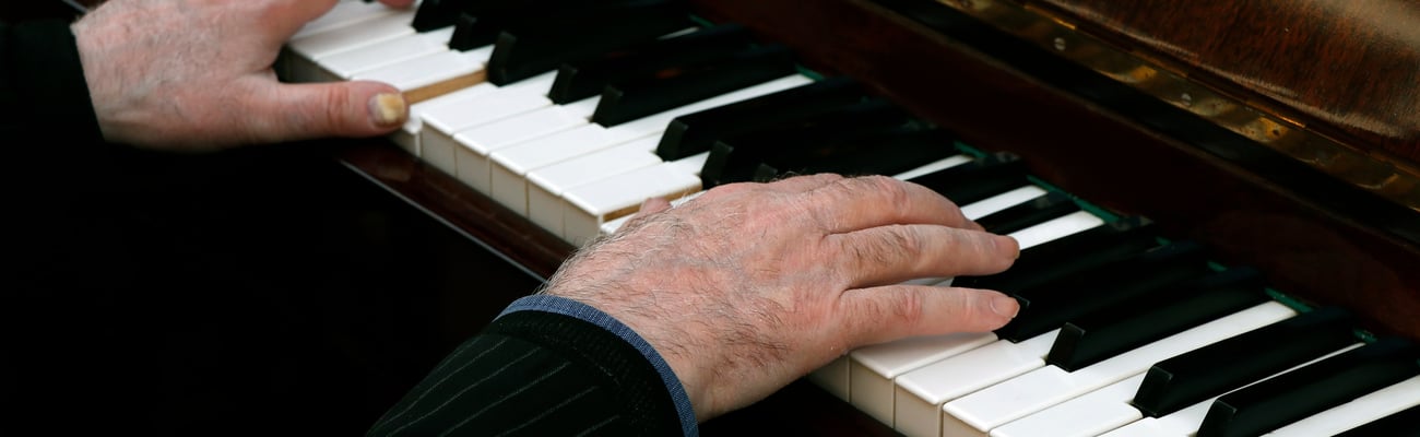 male hands at a piano