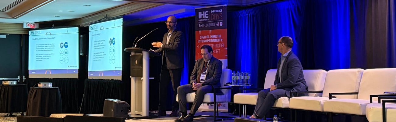 Abhi Kalra delivering remarks at IHE Connectation in Toronto on Feb. 4, 2025.