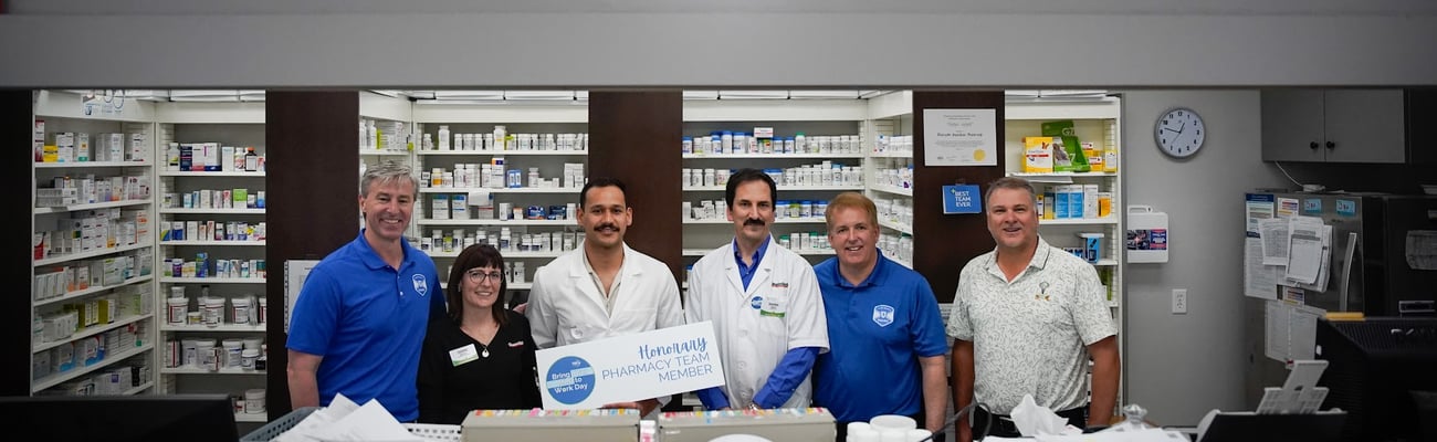 Premier Tim Houston and the Honourable Scott Armstrong with the Guardian Pharmacy team in Stewiacke, NS