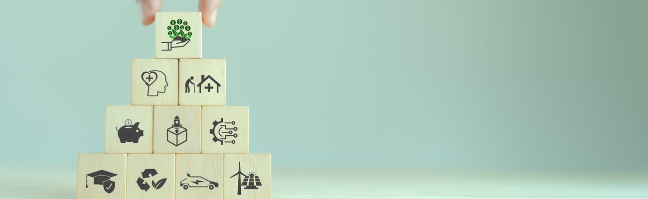 blocks stacked with images of activities impacting environment