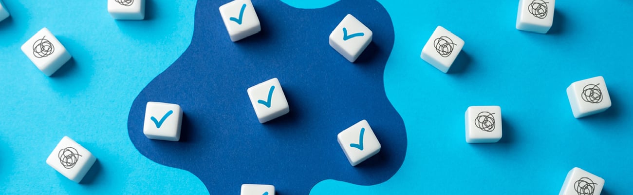 Blue graphic covered in white dice