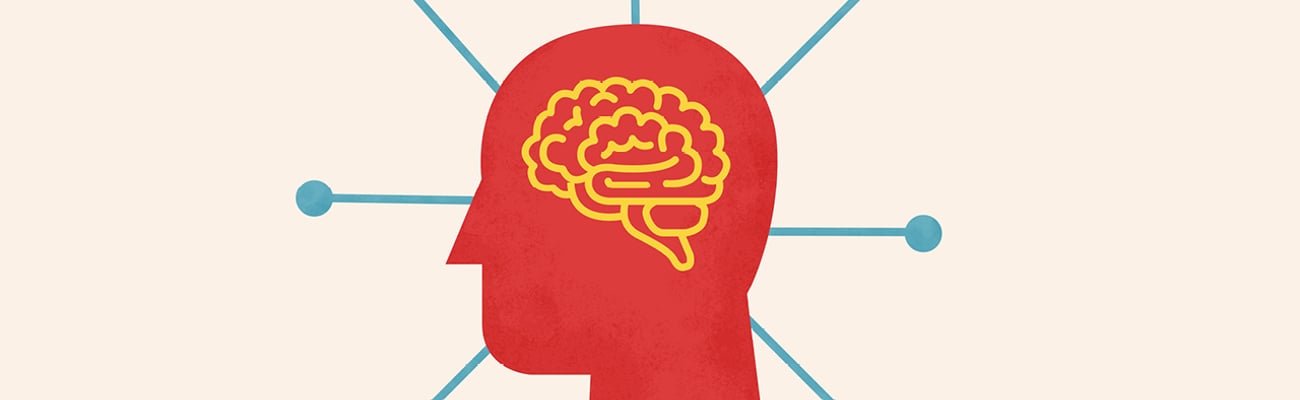 A cartoon of a human head in profile with a yellow cartoon brain inside