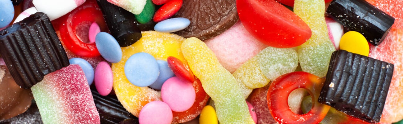 Set with different colorful candies on white background, top view.; Shutterstock ID 1329550880