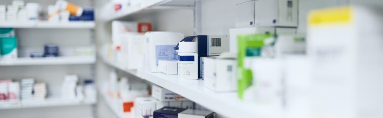 Pharmacy, medicine and box with healthcare store, shelf and prescription care pills. Medical, retail shop and supply of health supplements, vitamins and minerals for vitality and wellness dispensary; Shutterstock ID 2488685663