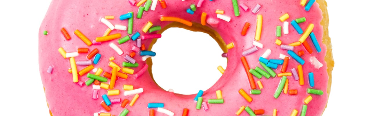 Donut with colorful sprinkles isolated on white background. Top view..; Shutterstock ID 523688161