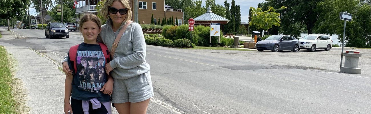 Les Cedres resident Amelie Rhéaume poses for a photo in Les Cedres, Que., on Wednesday, June 12, 2024. On June 6, the municipality of Les Cèdres, in the Monteregie region of Quebec, published a press release, reminding residents that children can play in certified free play zones on residential streets as long as they acquire the signatures of at least two-thirds of households on the street where they want to play. Rhéaume says the bylaw is of little use and won't be respected. THE CANADIAN PRESS/Joe Bongio