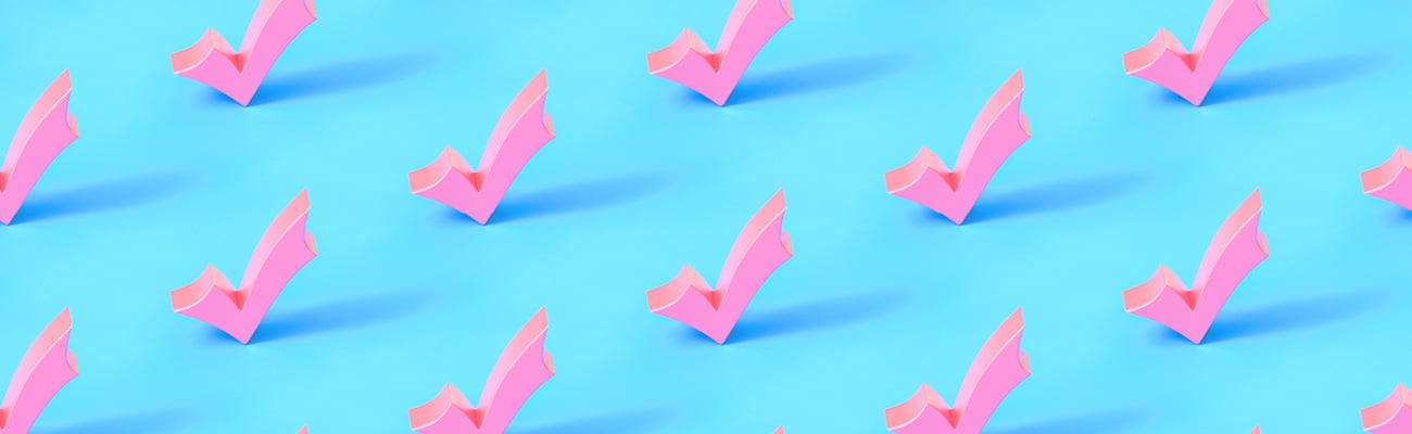 Wallpaper of pink checkmarks on a bright blue background