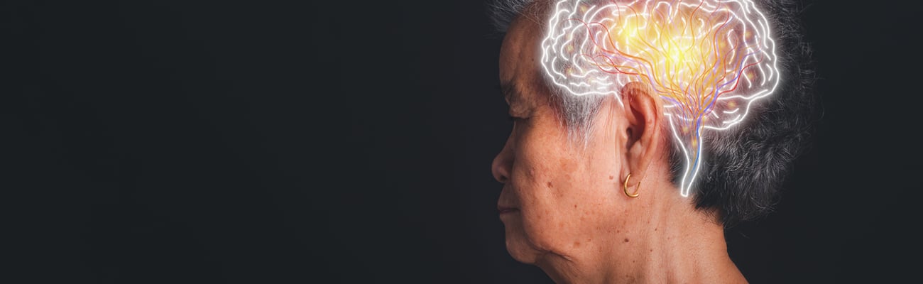 Profile of an older woman with a brain superimposed to represent neurological conditions
