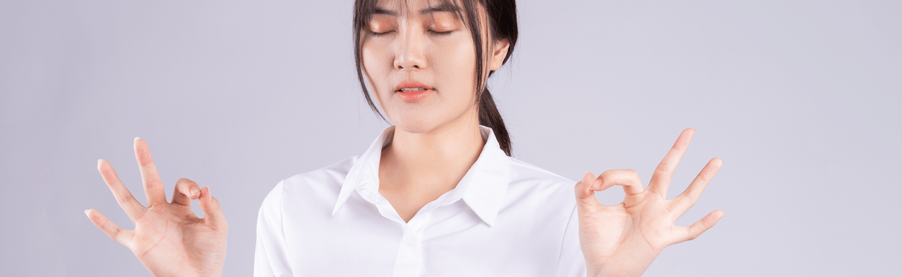 hz version of young asian woman doing breathing exercise