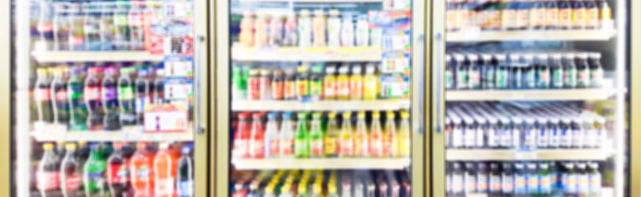 Blur image of beverage cooler in a convenience store.; Shutterstock ID 1084460336