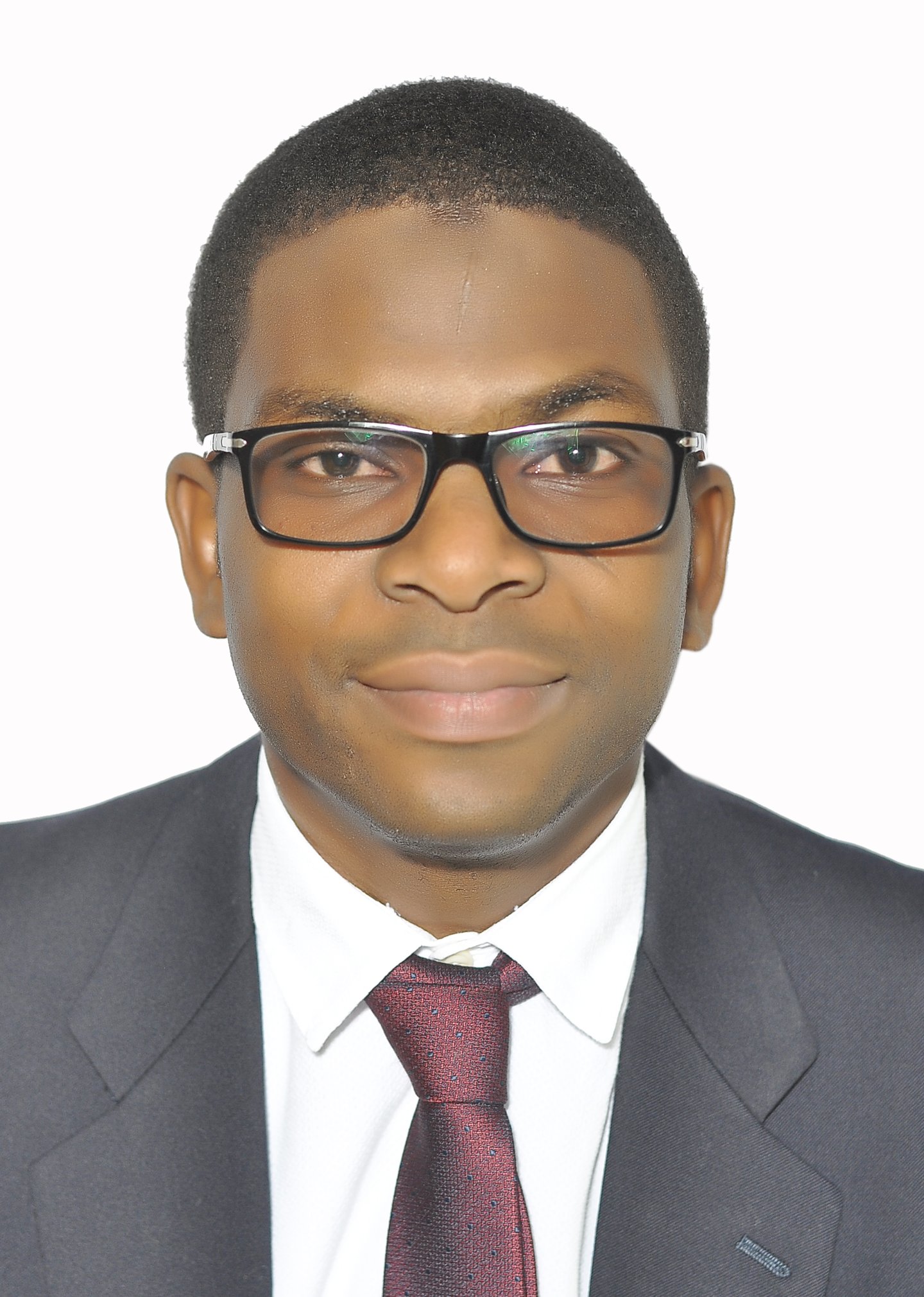 a man wearing glasses and a suit and tie