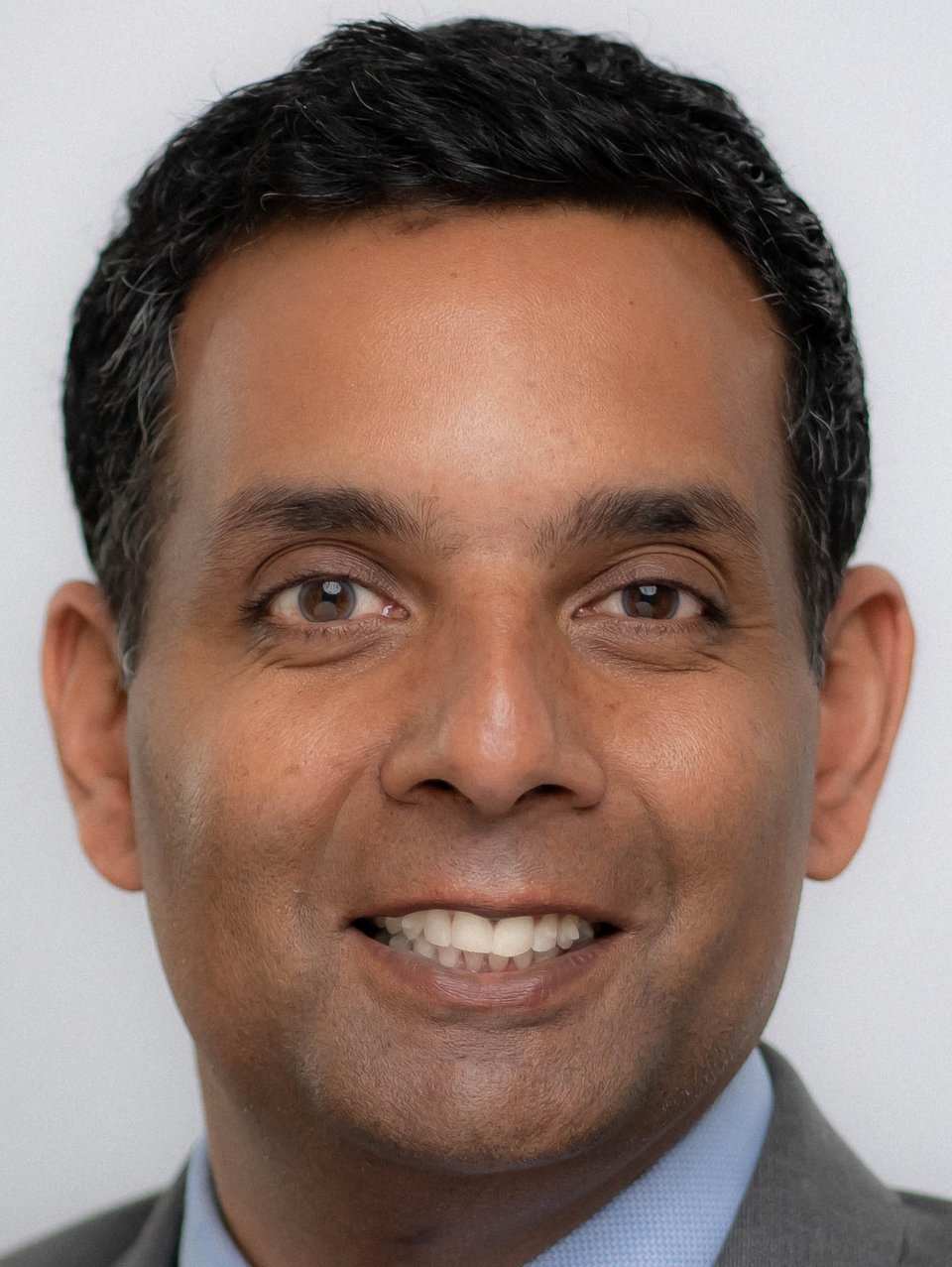 Sinha. headshot.