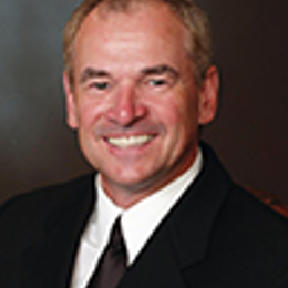 a man wearing a suit and tie