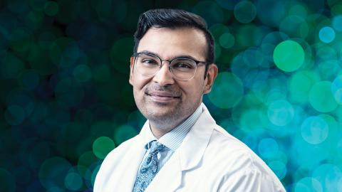 Man in glasses and lab coat